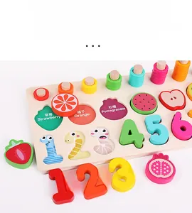 Macro shot of wooden puzzle board with colorful counting rings and fruit shape slots