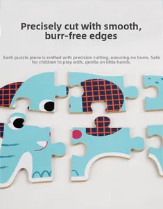 Close-up of thick wooden puzzle pieces showing smooth edges and a blue elephant design