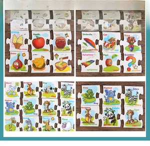 Close-up of vibrant English alphabet matching puzzle cards with animal and fruit patterns