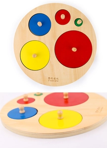 Macro shot of circular wooden puzzle with colorful round blocks and small handles