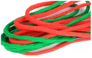 Macro view of red and green braided cotton cords for DIY educational lacing toys
