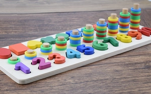 Macro detail of wooden educational board with colorful 3D numbers and stacking rings