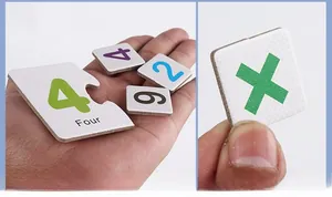 Detail of colorful wooden number matching cards with math symbols for kids' learning