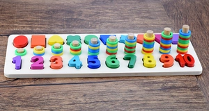 Detailed view of wooden puzzle board with colorful numbers and geometric shapes