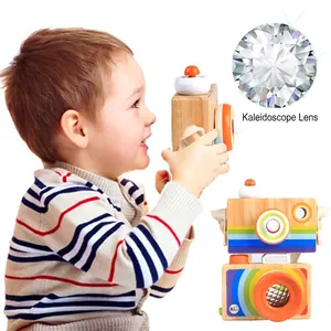 Wooden toy camera with kaleidoscope lens and rainbow strap for creative kids play