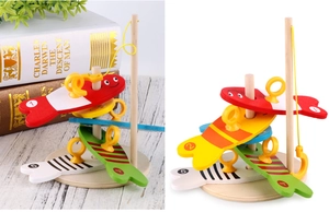 Detailed set of wooden magnetic fishing toy with colorful numbered fish and a fishing rod