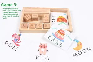 Detailed view of wooden alphabet blocks and animal word cards for spelling learning