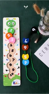 Detail of wooden caterpillar puzzle with colorful number beads and green threading rope