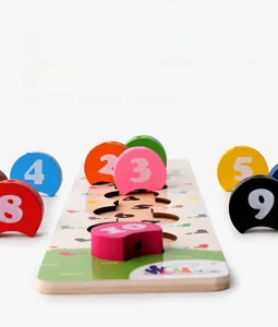 Detailed macro view of colorful wooden number blocks and matching slots for early learning