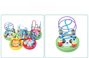 Macro detail of wooden bead maze toy with cute panda base and colorful wire track