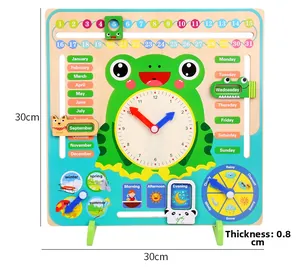 Detail of frog-themed wooden calendar board with weather, date and time for kids