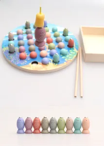Detail of wooden magnetic fishing toy set with colorful fish and rod for kids