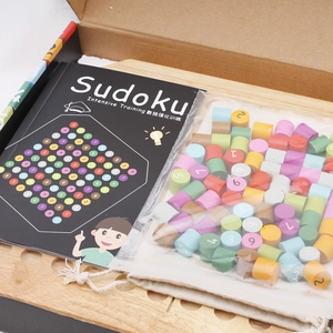 Educational wooden Sudoku board game set with colorful number blocks and manual for kids