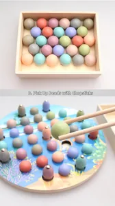 Detail showing the 2-in-1 magnetic fishing game and wooden bead sorting educational toy