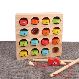 Wooden magnetic fishing game for kids featuring colorful numbered fish and a solid wood base
