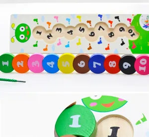 Detail of wooden caterpillar counting toy with rainbow numbered blocks and green threading cord