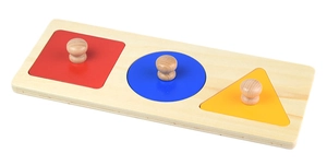 Macro detail of wooden Montessori puzzle with colorful geometric shapes and knobs