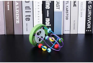 Close-up of a panda-themed wooden bead maze toy with colorful metal tracks and beads
