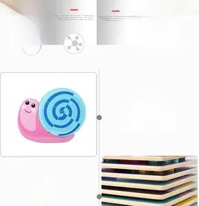 Close-up of smooth wooden snail puzzle piece showing safe edges for toddlers