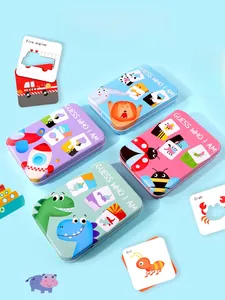 Macro view of four themed tin boxes with educational matching cards for kids
