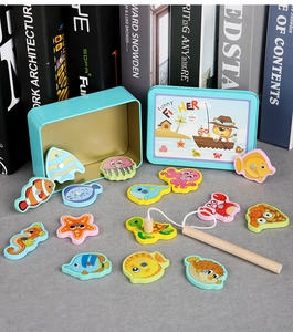 Detail of wooden magnetic fishing toy set with blue tin box and cartoon sea animals