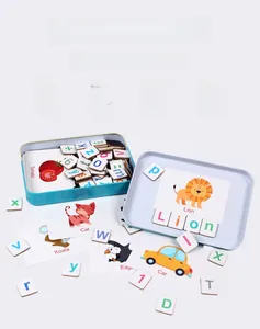 Detail view of colorful magnetic alphabet letters and educational word cards in a tin box