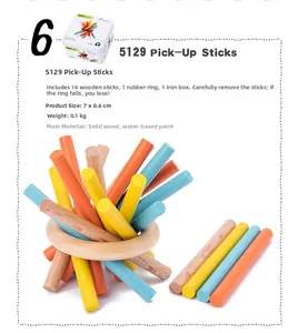 Detailed view of pick-up sticks toy set with 16 wooden sticks and iron storage box