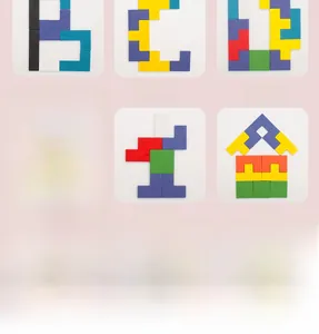 Macro shot of colorful wooden blocks forming letters and creative shapes for early learning