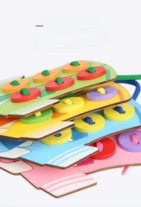 Detail of colorful wooden threading toy boards with solid wood core and sewing buttons