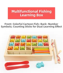 Detail of wooden magnetic fishing toy with colorful fish, counting sticks and tweezers