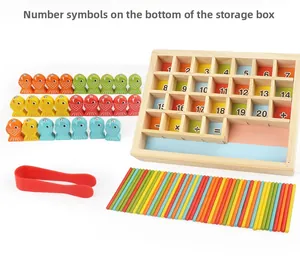 Educational wooden fishing box detail showing sorting slots for numbers and math symbols