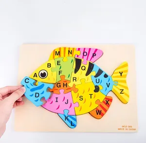 Macro detail of wooden fish puzzle with colorful 26 English letters for toddler learning