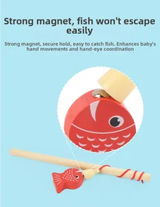 Detail of wooden magnetic fishing toy with red fish and rod for motor skill development