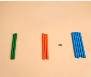 Close-up of colorful wooden counting sticks for basic addition and math exercises