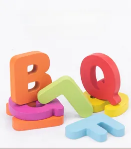 Close-up of colorful wooden alphabet blocks for early childhood learning and cognition