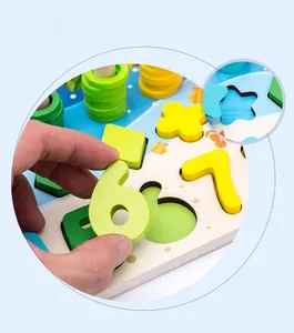 Detail of laser-cut wooden number puzzles and sorting rings for toddler early learning