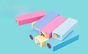 Close-up of smooth wooden animal blocks stack showing colorful paint and animal motifs