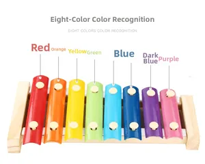 Detail of 8-color metal keys on wooden xylophone for baby music and color learning