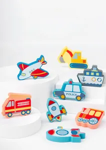Detail of wooden vehicle puzzle pieces including plane, excavator and police car for kids
