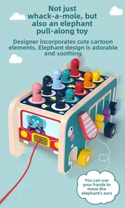 Detail of wooden elephant pull toy featuring whack-a-mole game and colorful beads