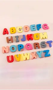 Macro detail of colorful wooden alphabet puzzles and word building blocks for kids