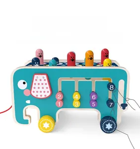 Detail of wooden elephant educational toy with numbered beads and rolling wheels