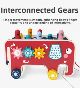 Wooden whack-a-mole toy with colorful spinning gears and bouncing animal pillars for kids