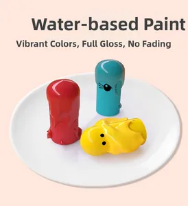 Detail of glossy red blue and yellow water-based paint on wooden toy moles