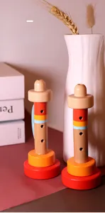 Detailed view of colorful wooden trumpets with smooth texture for early childhood education