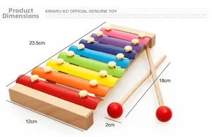 Detailed view of rainbow xylophone with wooden base and dimensions of 23.5cm by 12cm