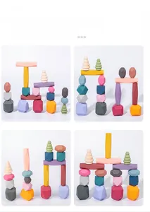Macro detail of various colorful wooden balance stones in multiple stacking arrangements