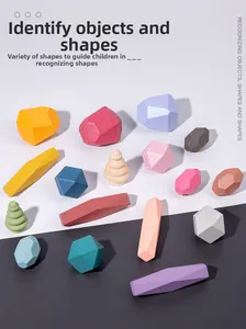 Macro shot of 16 colorful wooden stacking stone blocks showing smooth matte textures