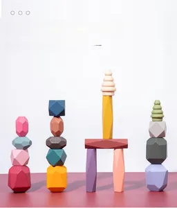 Nordic Morandi colored wooden blocks arranged in decorative geometric towers