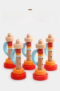 Detailed view of colorful wooden toy trumpets for children with smooth painted finish